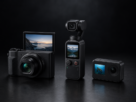 Câmera de filmagem 4K — três modelos compactos lado a lado sobre superfície escura com iluminação de estúdio para comparativo de câmeras para vídeo.