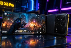Smartphone gamer poco x6 pro com tela acesa exibindo jogo colorido sobre mesa com luzes neon ao fundo